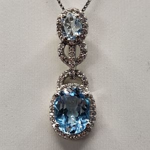 SOLD. Sterling Silver Drop Pendant necklace. Double Blue Topaz Pendant.